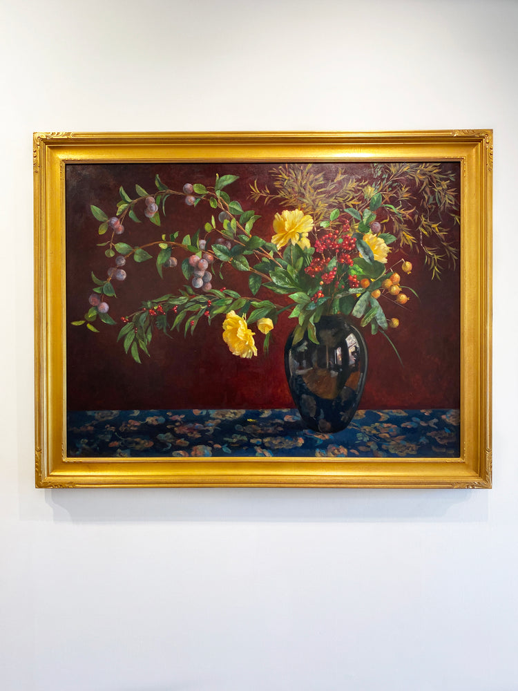 Arrangement with a black vase