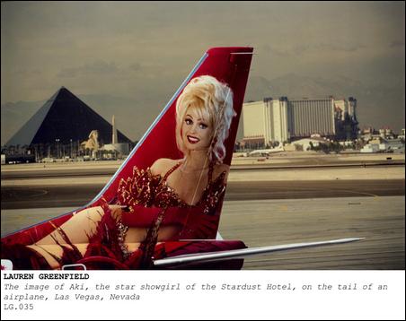 The Image, of Aki, the star showgirl of the Stardust Hotel, on the tail of an airplane, Las Vegas, Nevada, 1995